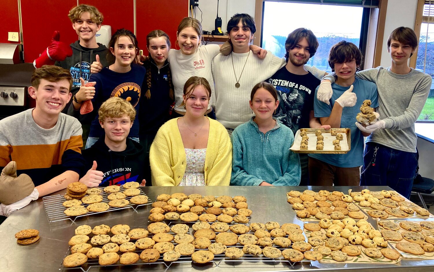 The Port Townsend High School Key Interact Club shows off some of the 300-plus cookies they baked for the Nov. 25 “Community Bowls and Soup Share.” Courtesy photo